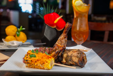 Sisserou's signature dishes Chicken Rasta
Jerk Chicken Tacos
Jerk Chicken